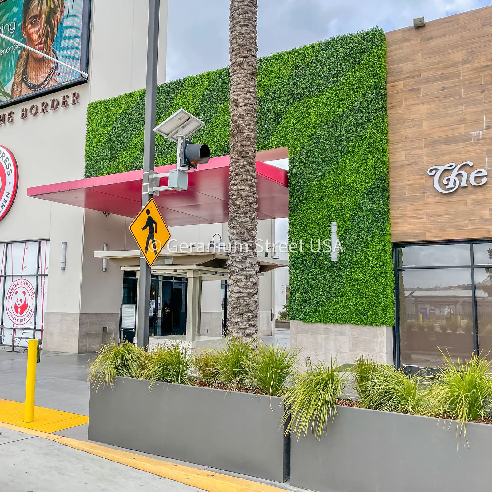 Biophilic design with artificial green walls for offices and retail