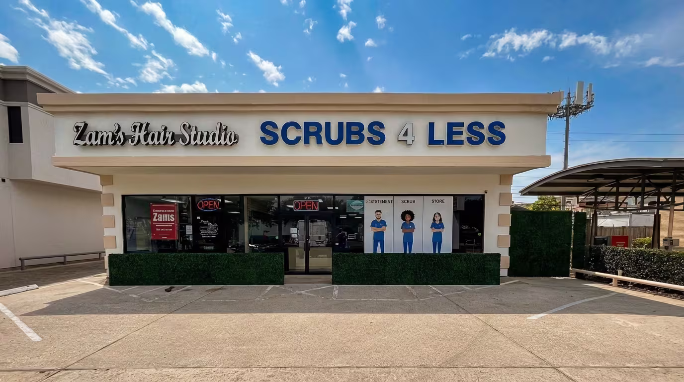 Houston Storefront Hedge Screening Over Existing Concrete Barriers